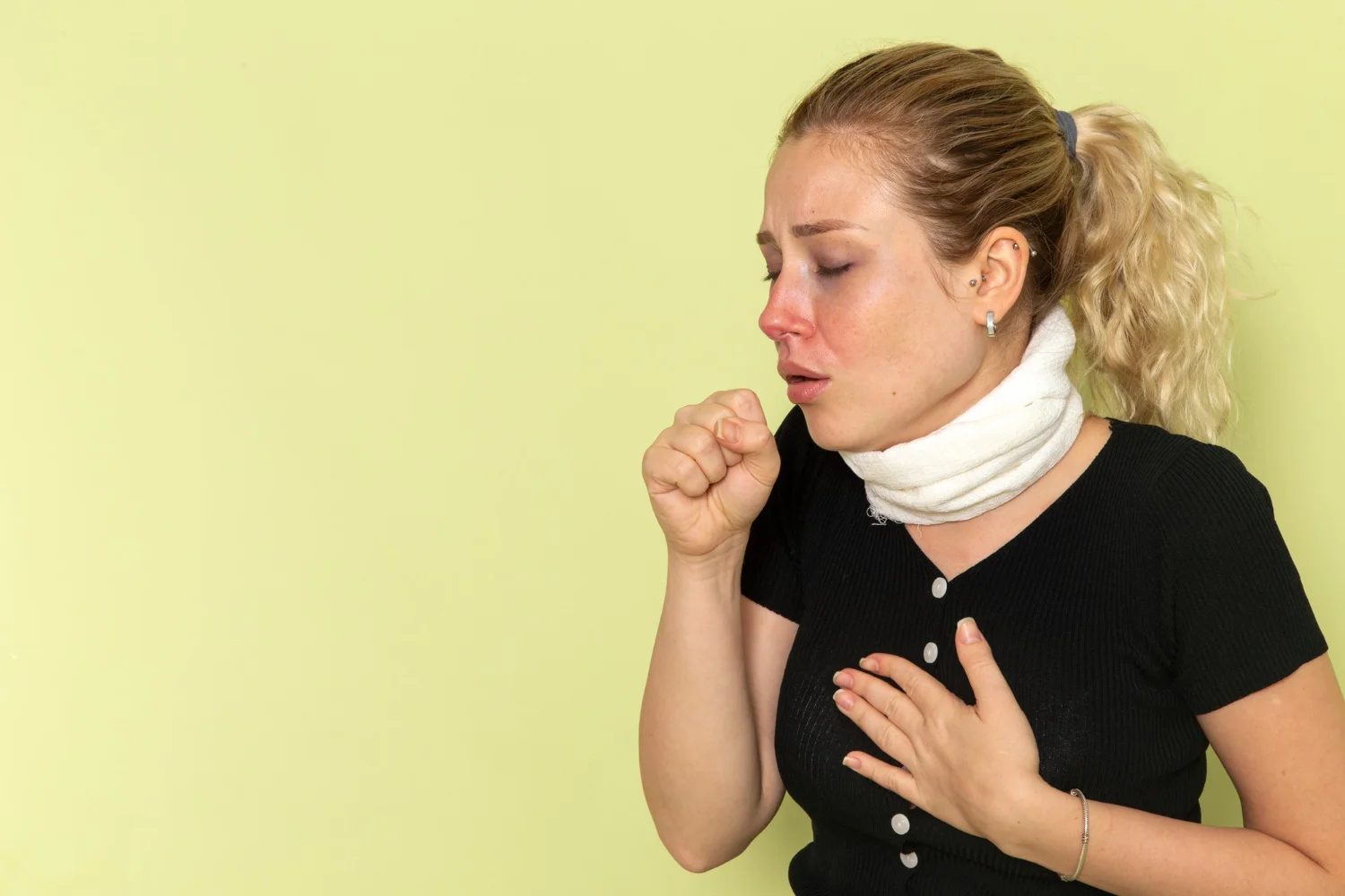 Person having difficulty breathing and experiencing respiratory symptoms